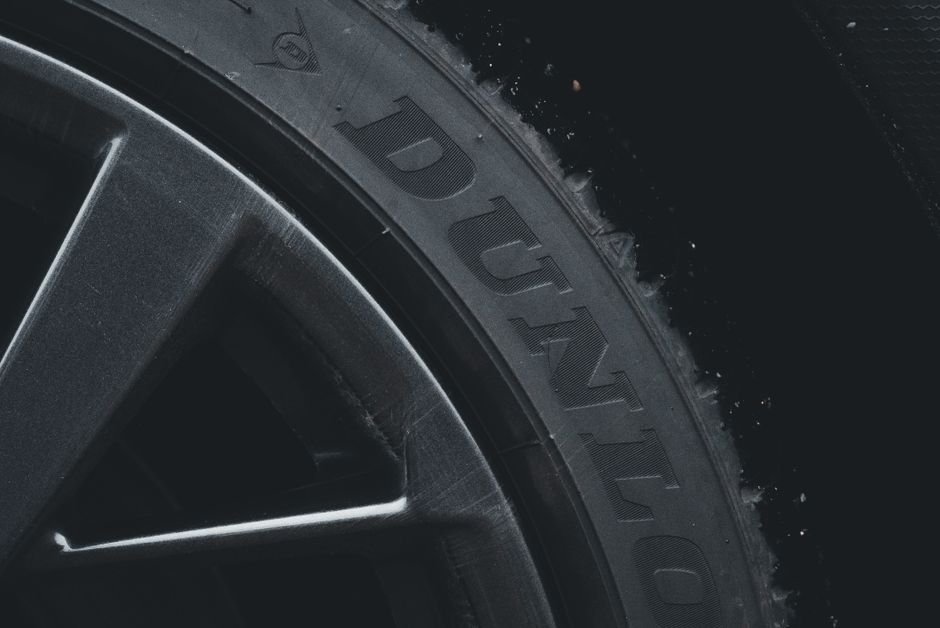 Close-up of tyre tread on a wet road