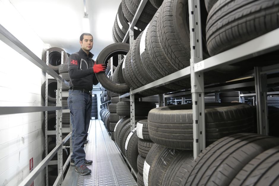 Stack of car tyres in a warehouse
