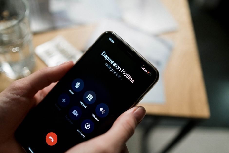 Person calling for help on the phone
